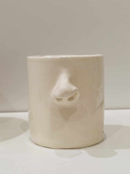 Cache pot nez